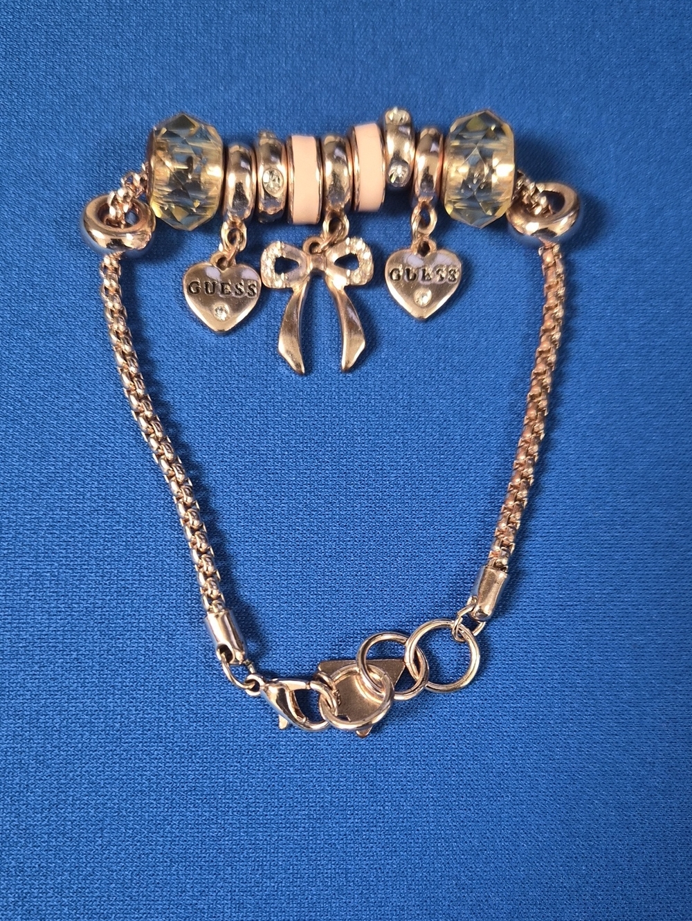GUESS Rose Gold Charm Bracelet with Pink Beads and Crystal Accents